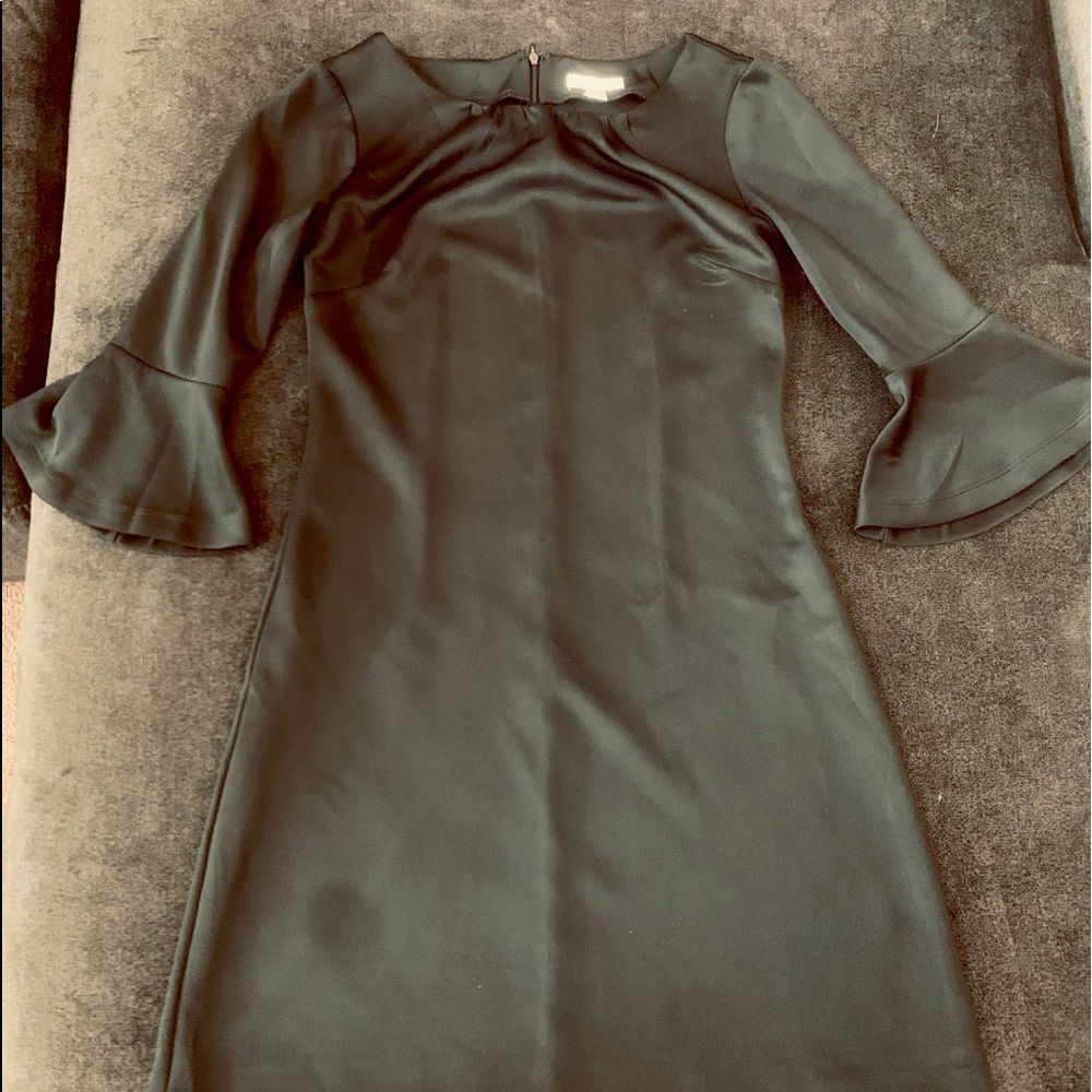 Very cute and stylish New York & Company stretch black cocktail dress.